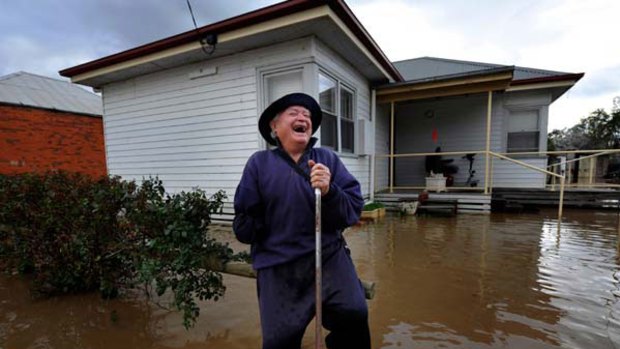 Bill Perry has a laugh about his house, which he had to evacuate yesterday morning.<i>Picture: Justin McManus</i>