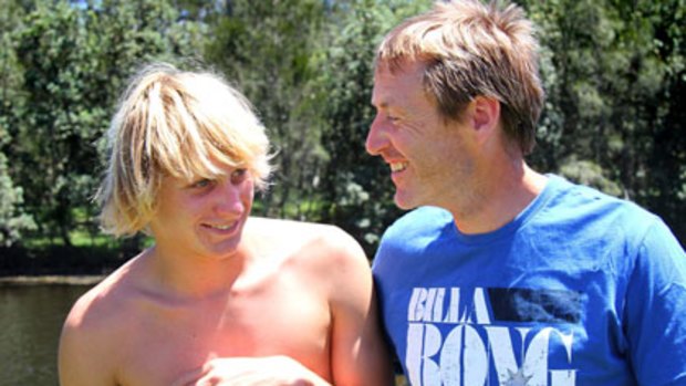 ‘‘I wouldn’t have gone’’ ... shark attack victim Andrew Lindop, 16, and his father Charles have urged the Government to set up a communication system so surfers can make informed decisions.