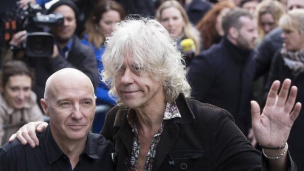Please stop ... Musicians Midge Ure (left) and Bob Geldof attend the recording of the Band Aid 30 charity single in west London, November 15.