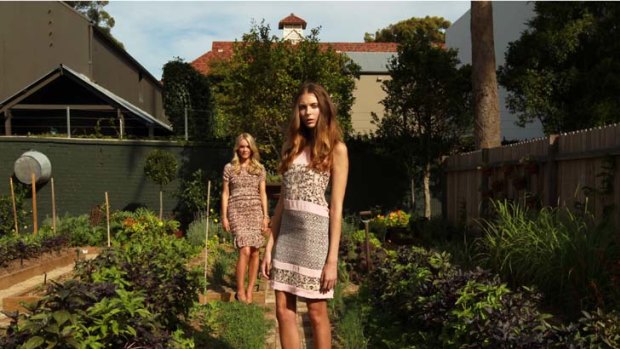 A look ahead &#8230; designer Rebecca Vallance, rear, presents a design from her spring summer collection, worn by Meagham Waller in the vegetable garden at Chiswick Restaurant yesterday.