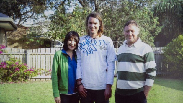 Eden Waugh with his parents Elaine and David, who have appealed for people to come forward with information about his death.