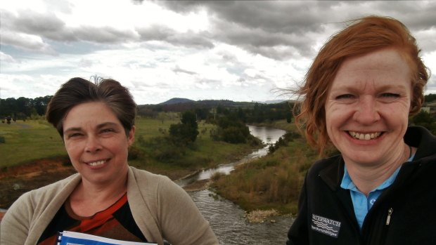 Upper Murrumbidgee Waterwatch co-ordinator Woo O'Reilly, right, with long serving Waterwatch volunteer, Fiona Spier, at Scrivener Dam.