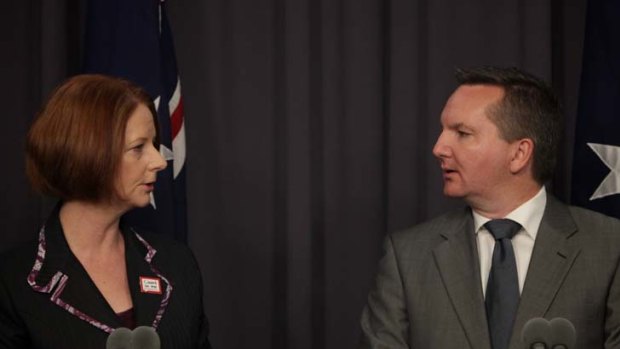 Final outcome &#8230; the Prime Minister, Julia Gillard, and the Immigration Minister, Chris Bowen, discuss the asylum seeker policy at Parliament House yesterday.