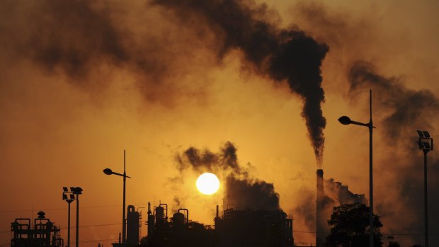 Environmental hazard: Factories pour chemicals likely to increase global temperatures into the atmosphere.