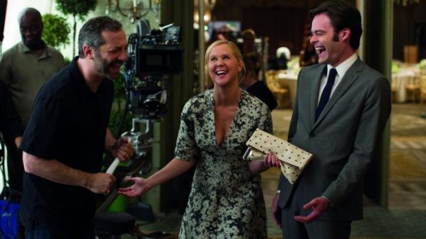 Director Judd Apatow, Amy Schumer and Bill Hader during the shooting of <i>Trainwreck</i>.