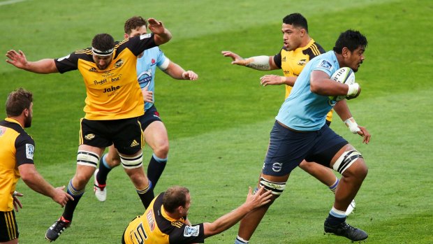Big man running: Will Skelton gets into his stride for the Super Rugby champion Waratahs. 