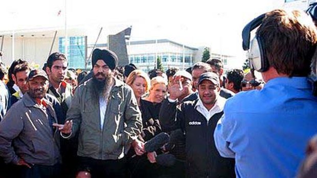Angry cabbies rally outside Brisbane Airport earlier this week.