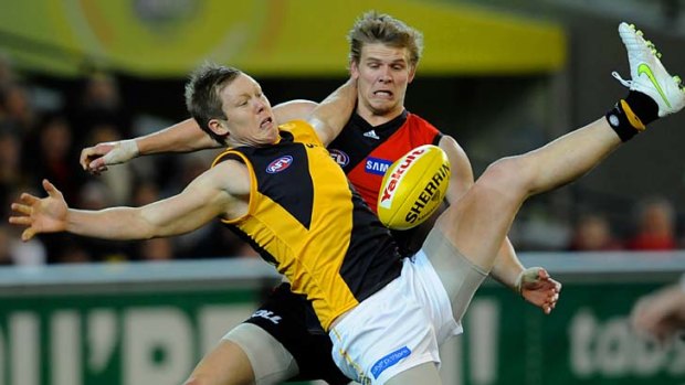Jack Riewoldt and Michael Hurley do battle.