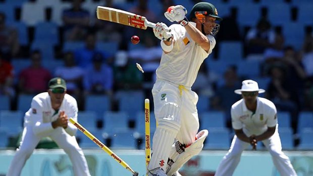 David Warner has his stumps uprooted by Dale Steyn (not in pic).