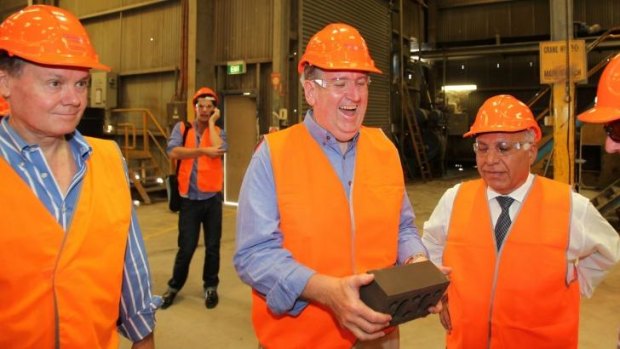 Brickworks managing director Lindsay Partridge, left, with the then opposition leader Barry O'Farrell, at Austral Brickworks on March 12, 2011.