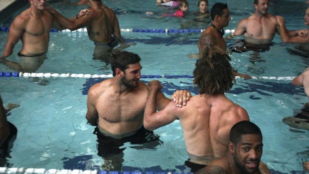 Rabbitohs recover ... Dave Taylor, centre, cools down with Matt King and their South Sydney teammates. Despite signing with Gold Coast for next season and beyond, Souths players hold no grudges towards Taylor.