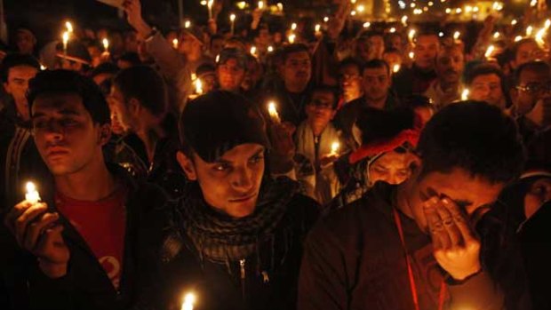 Demonstrators in Cairo's Tahrir Square hold a candelight vigil for the people killed during protests against Egyptian President Hosni Mubarak.