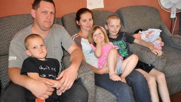Homeless ... Cooma family Geoff and Nicole McKenzie with their three children, Tyler, Elizabeth and Connor.