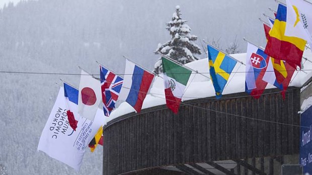 The roof of the Congress Centre is covered with snow as the 42nd Annual Meeting of the World Economic Forum, WEF, in Davos, Switzerland kicks off.
