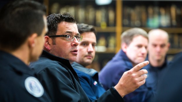 Premier Daniel Andrews with  volunteer and staff firefighters at the Springvale CFA station.