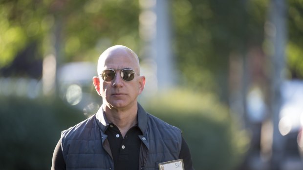  Apparently the best way for a company to shield itself from Supreme Commander Jeff Bezos is to find a big brute who is slightly less of an  immediate threat.