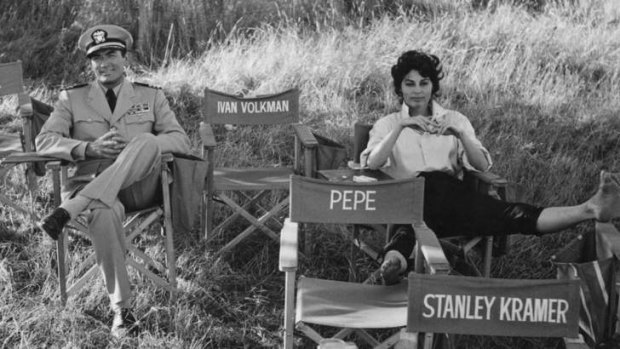 Gregory Peck and Ava Gardner relax between scenes during filming for <em>On The Beach</em>.