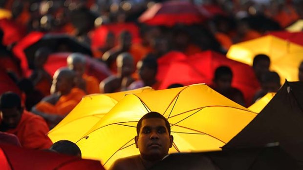 Buddhist monks protest in Colombo against the US-led move to censure Sri Lanka at the ongoing UN Human Rights Council sessions in Geneva over its alleged war crimes while crushing Tamil rebels in 2009.