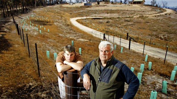 Justified: After suffering court action that cost the family $100,000, Liam Sheahan, pictured with his son Rowan, believes clearing his property saved their home and their lives.