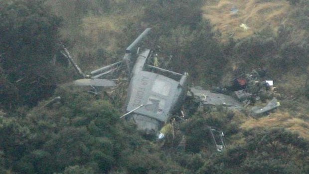 The wreckage of the NZ Air Force Iroquois helicopter that killed three people.