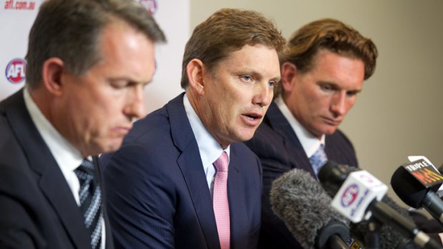 Essendon CEO Ian Robson, president David Evans and coach James Hird at the press conference.