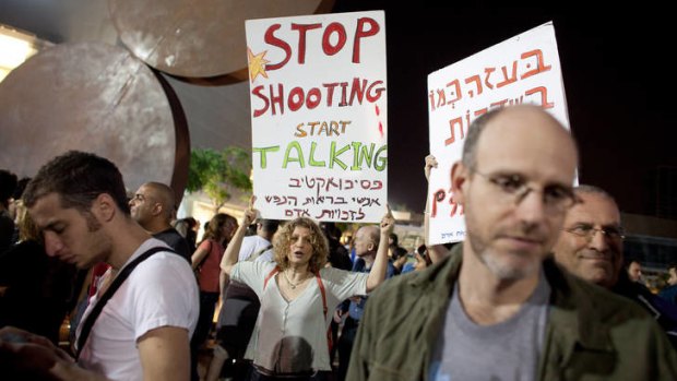 Left-wing Israeli activists demonstrate  in Tel Aviv against the Israeli airstrike on Gaza.