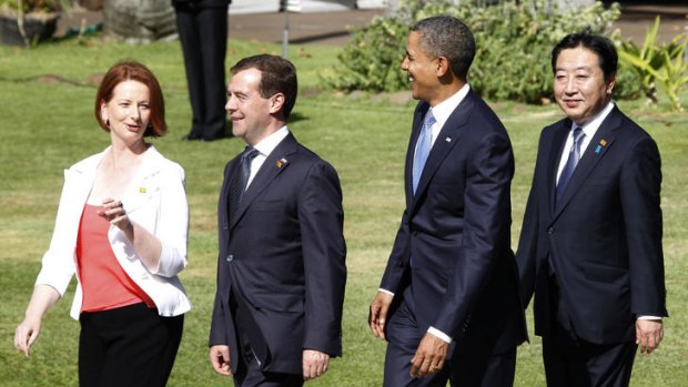Julia Gillard walks with, from left, Dmitry Medvedev, Barack Obama and Yoshihiko Noda for the official photo at the APEC summit.