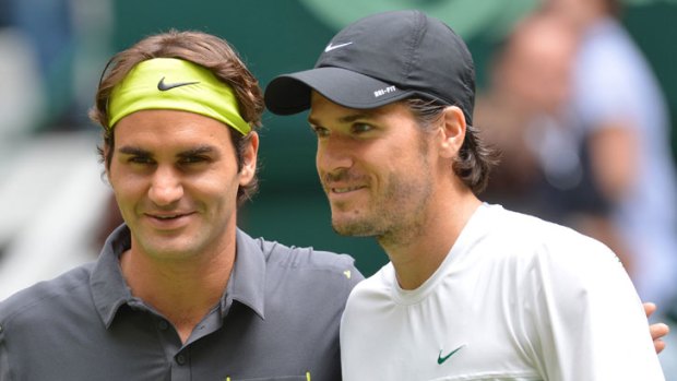 Roger Federer and Tommy Haas pose before their final in Halle. The German beat Federer in straight sets.