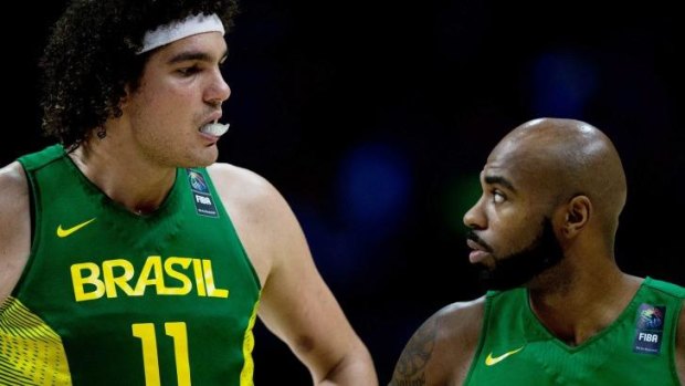 Anderon Varejao, left, and Larry Taylor could not find the answers for Brazil.
