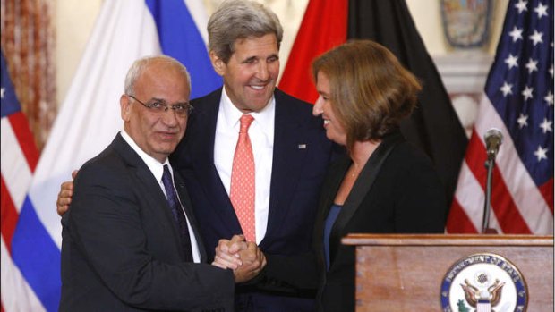 Chief Palestinian negotiator Saeb Erekat, US Secretary of State John Kerry and Israel's Justice Minister Tzipi Livni.