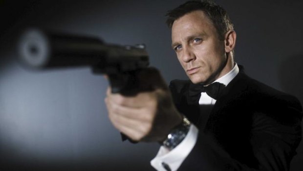 Daniel Craig playing James Bond.