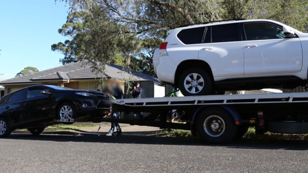 Love scam: police seized a number of cars.