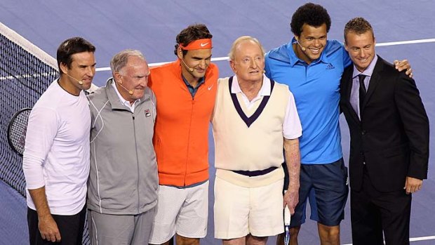 Pat Rafter, Tony Roche, Roger Federer, Rod Laver, Jo-Wilfried Tsonga and Lleyton Hewitt pose during the Roger Federer Charity match at Melbourne Park on Wednesday.