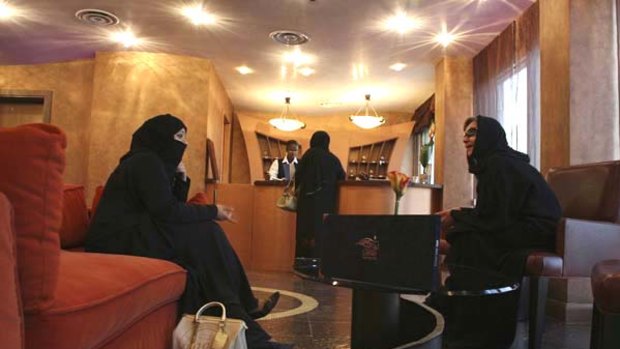 Saudi women rest in the lobby of the Luthan Hotel, which caters exclusively to women.