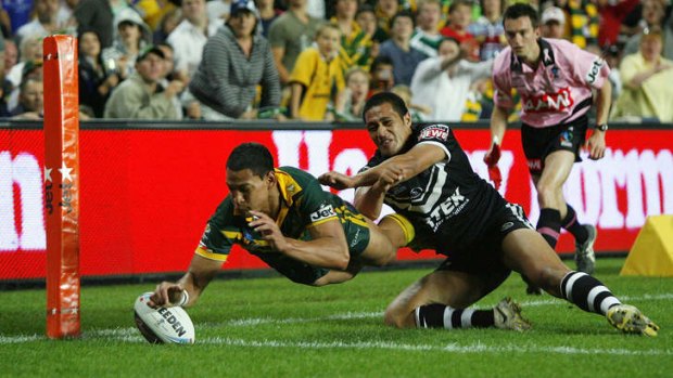 Playing for the Kangaroos: Folau scores a try against New Zealand at the SFS in 2008.