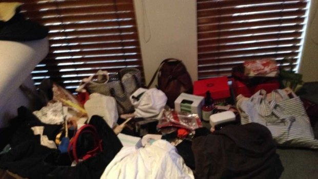 Patricia Amad's pile of possessions after decluttering her wardrobe, ready to be given away. 