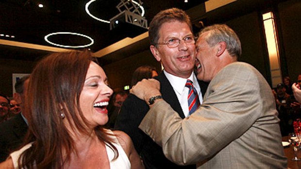 Hugs from the faithful as Ted Baillieu and wife Robyn arrive at the Liberal Party function in the Sofitel hotel on Saturday night.