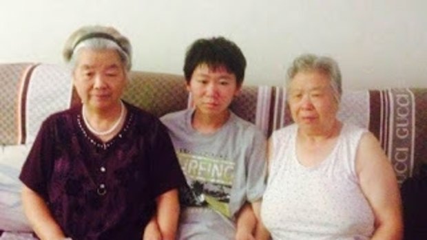 Bao Zhuoxuan pictured with his grandmother Tong Yanchun (right) in an undated photograph.