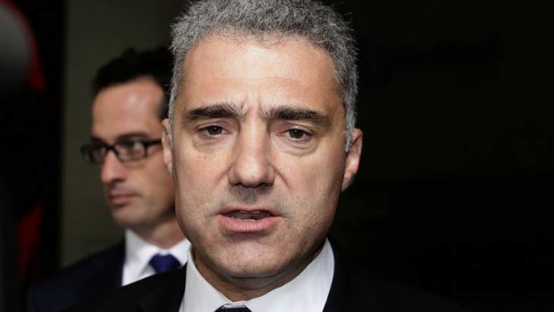In the spotlight: Liberal Party fund-raiser Paul Nicolaou leaves the hearing.