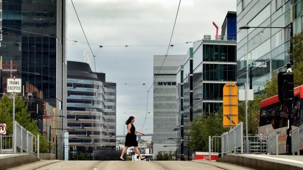 On the wrong track: The view down Collins Street looking west. Docklands has been ruled a soulless, dispiriting, windswept failure, its waterfront dominated by soaring towers.