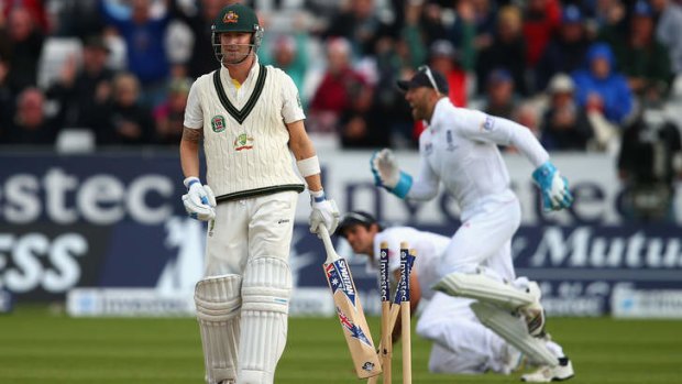 Done by a peach of a ball: Michael Clarke looks dejected after being bowled by Stuart Broad.