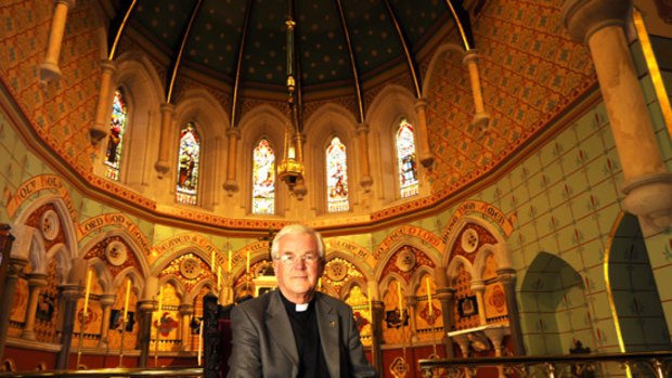 Father Ramsay Williams in the Anglican All Saints church in St Kilda.