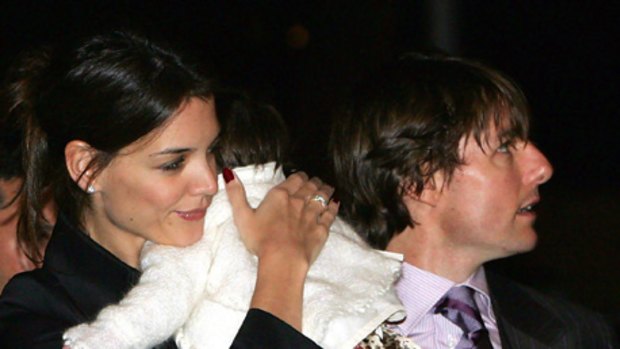 Won the argument ... Tom Cruise's daughter Suri will go to a Catholic school after Katie Holmes got her way.