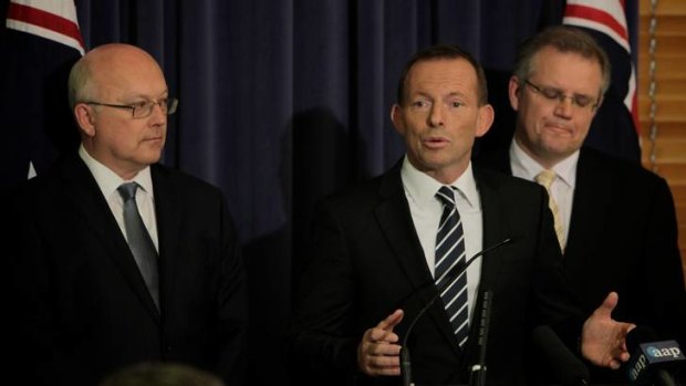 Shadow Attorney-General George Brandis with Opposition Leader Tony Abbott and Shadow Immigration Minister Scott Morrison.
