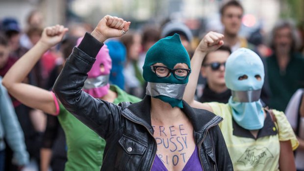 Global reaction ...  in Warsaw, protesters donned 'Pussy Riot' balaclavas to suport the punk band.