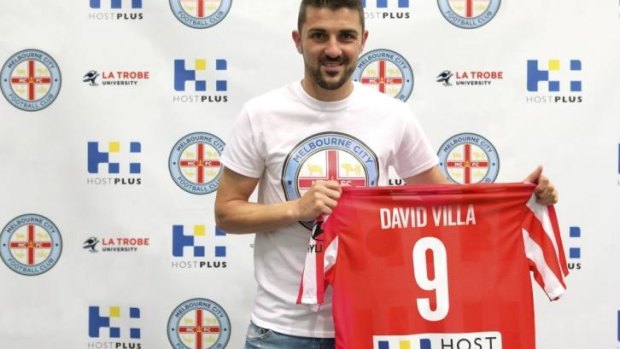 City slicker: Spain’s World Cup winner David Villa signs on.