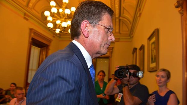 Ted Baillieu leaves the media conference after resigning as Premier.
