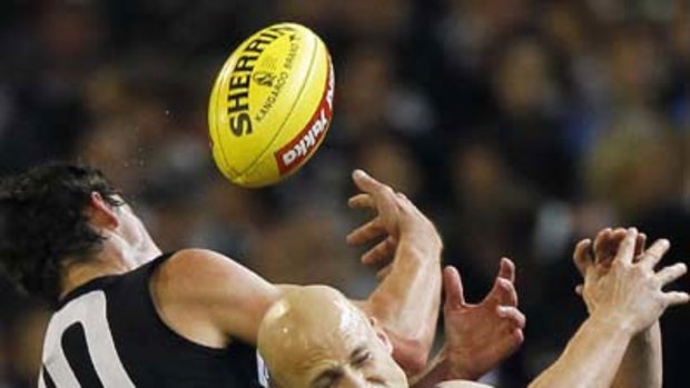 Collingwood's Scott Pendlebury and Geelong's Gary Ablett contest a mark in last night's big clash at the MCG.