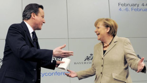 Agreement ... British Prime Minister David Cameron and German Chancellor Angela Merkel.