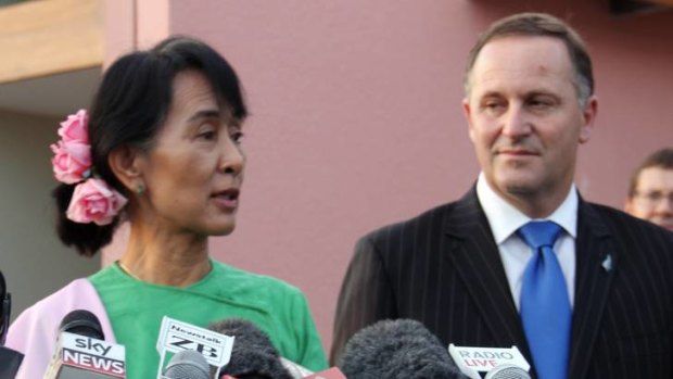 Naming rights ... Aung San Suu Kyi talks to the media after her meeting with John Key on Thursday.